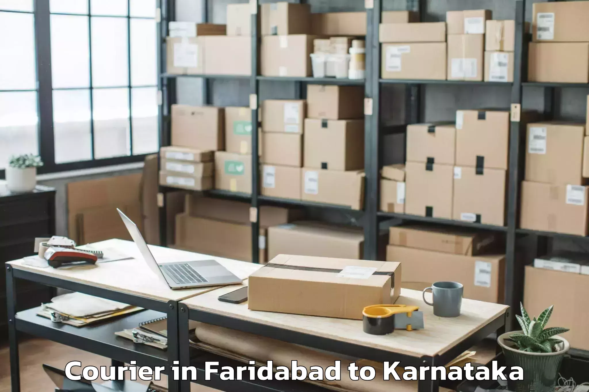 Easy Faridabad to Jagalur Courier Booking